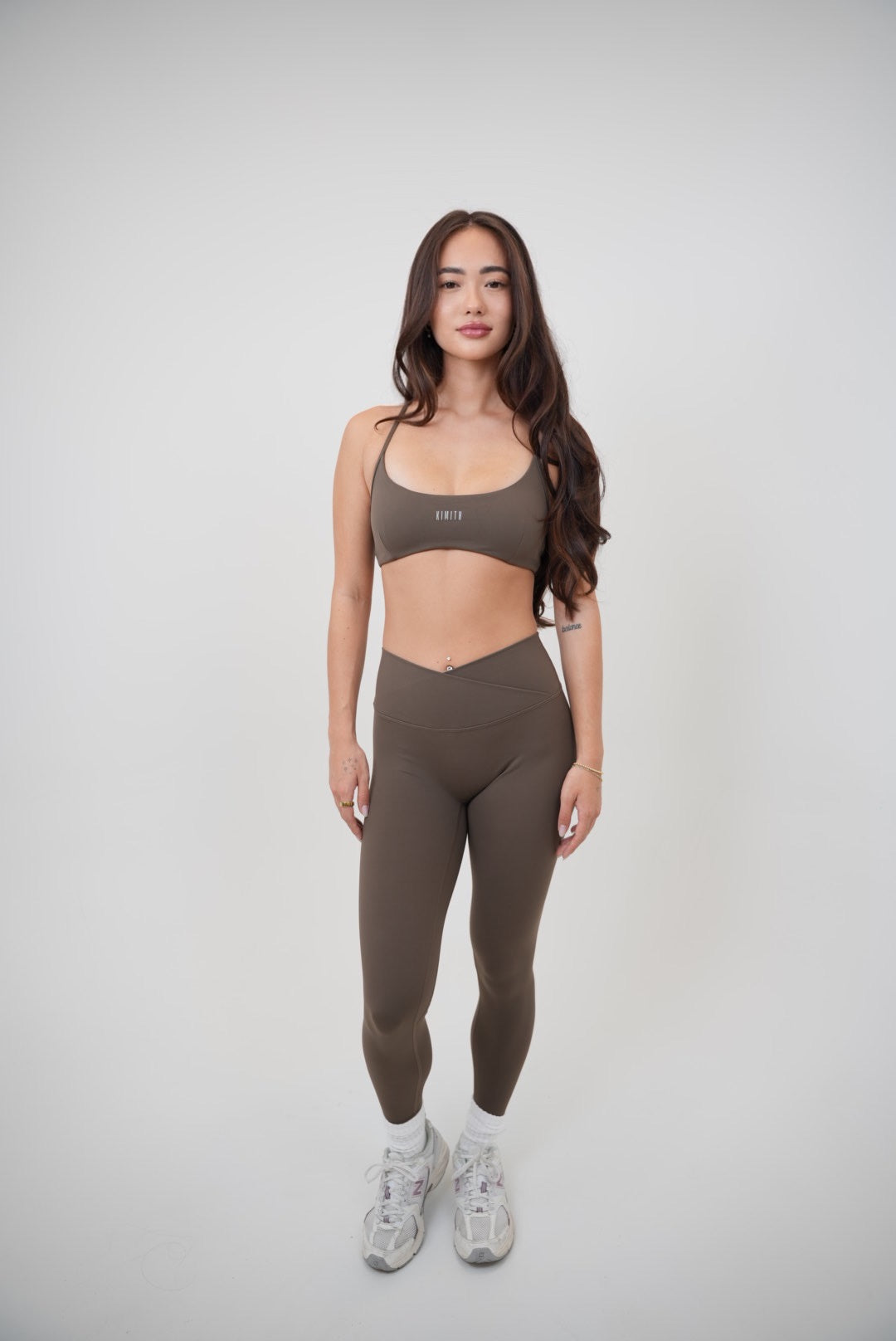 Brown sculpt V-waist legging by KIMITH BRAND featuring a high-rise fit and comfortable stretch for active wear.