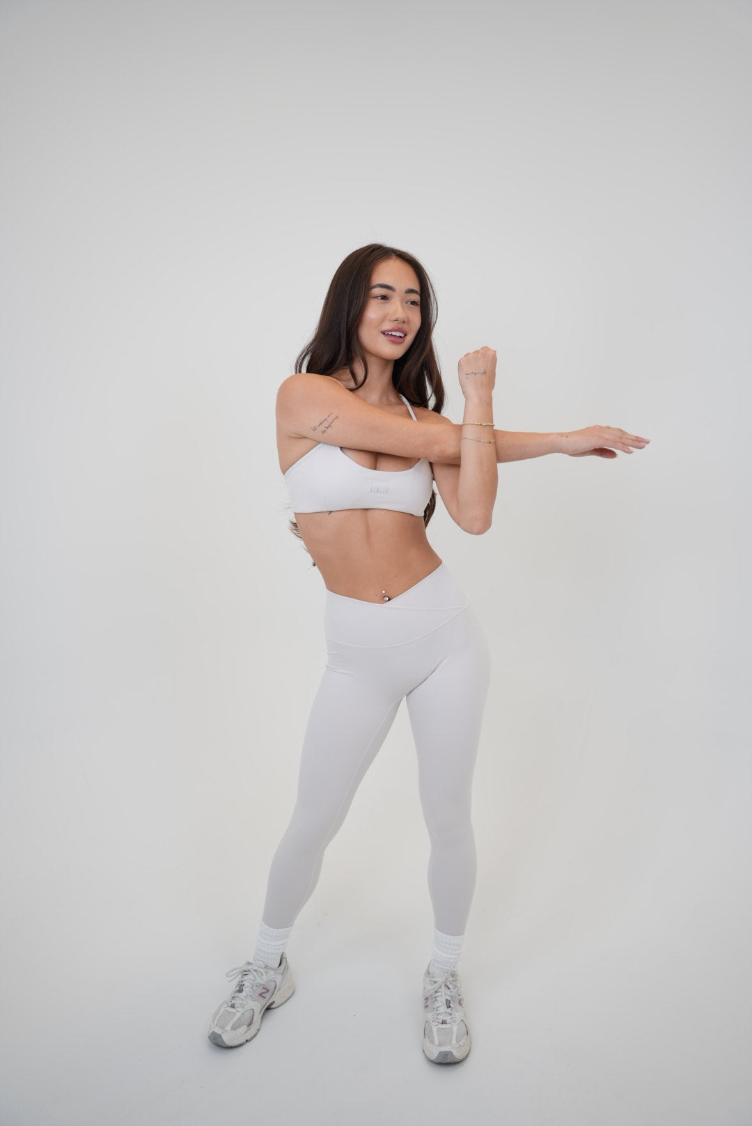 KIMITH BRAND My Time Is Divine Lime White Sculpt V-Waist Legging shown on a mannequin, highlighting the high-waist design and sculpting fit.