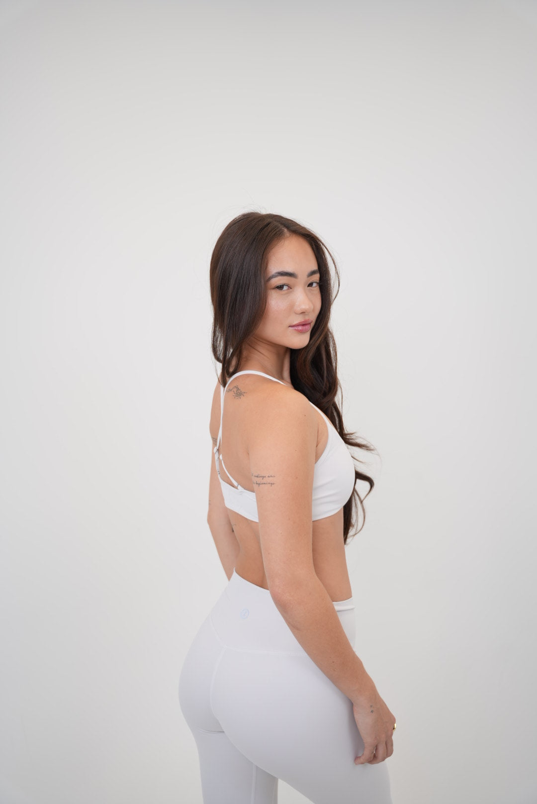 KIMITH BRAND My Time Is Divine Lime White Sculpt V-Waist Legging displayed on a model, emphasizing the V-waist and sculpting fit.