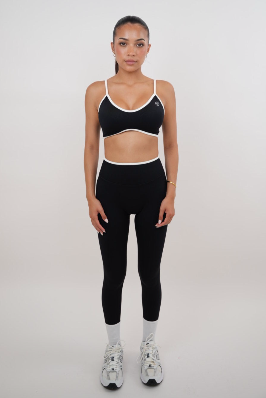Black Passion is Power leggings by KIMITH BRAND, stretchy athletic leggings with bold logo design and comfortable fit.