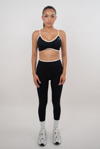Black Passion is Power leggings by KIMITH BRAND, stretchy athletic leggings with bold logo design and comfortable fit.