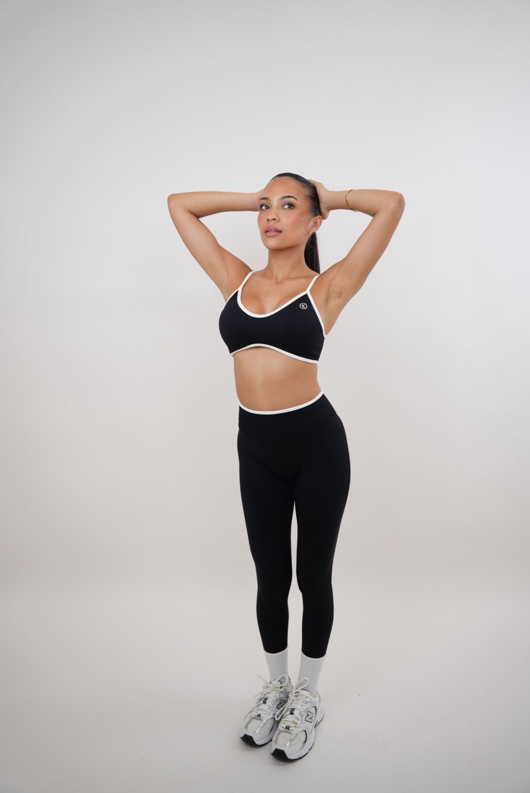Black Passion is Power leggings by KIMITH BRAND, featuring a sleek fit and comfortable stretch fabric for active wear.