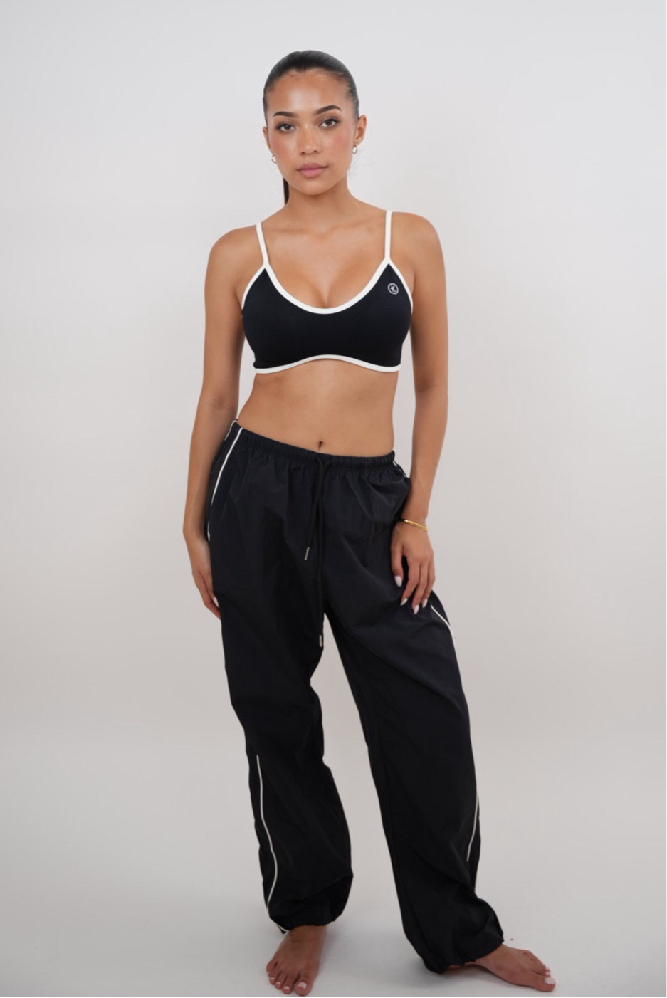 Black KIMITH BRAND relaxed fit pant titled "I Accept Change with Grace," versatile and comfortable for casual wear.