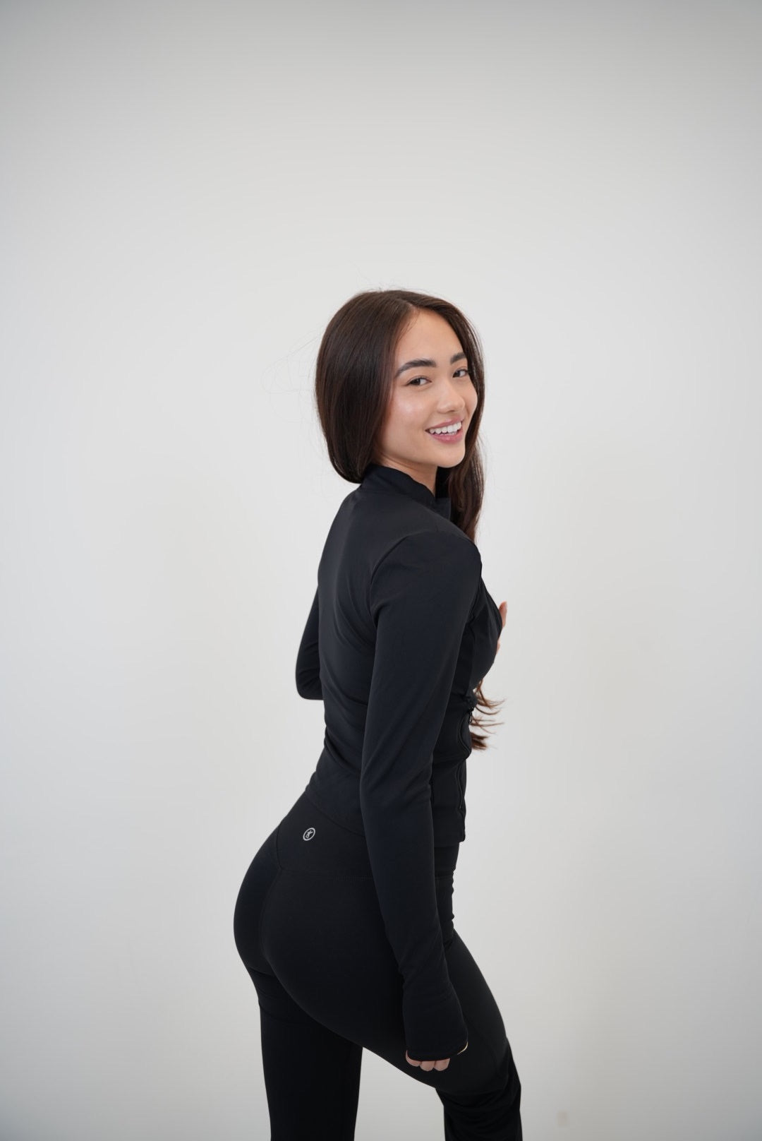 Black I Live in Luxury Perfect Fit Sweater by KIMITH BRAND, showcasing a stylish, fitted sweater with a sleek design.