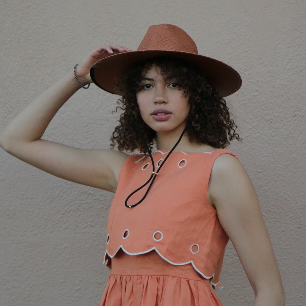 Ivory small sun hat from KIN THE LABEL Sun Hat Collection, featuring wide brim and lightweight fabric.