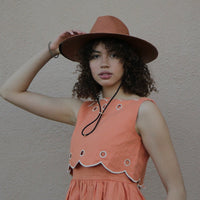 Ivory small sun hat from KIN THE LABEL Sun Hat Collection, featuring wide brim and lightweight fabric.