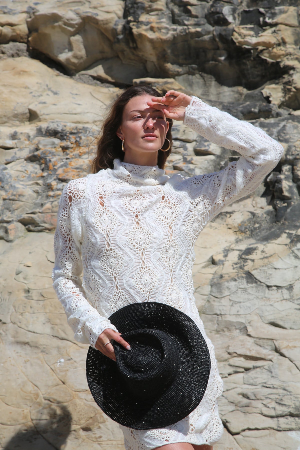 Kin the Label Resort Collection straw hat with a wide brim and raffia material, perfect for sun protection and stylish beachwear.