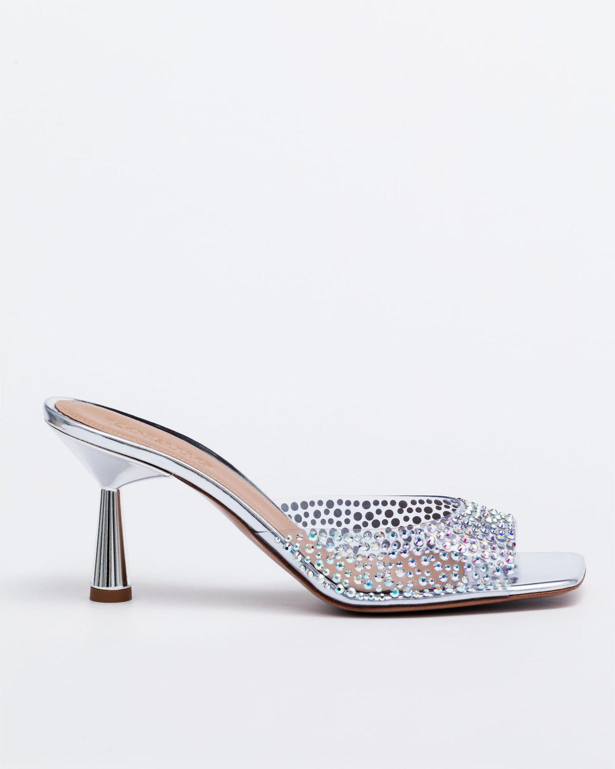 Silver Kolane Greta Mule slippers with crystal embellishments, slip-on mule style with a sleek design and decorative crystals.