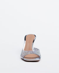 Silver Kolane Greta Mule slippers with crystal embellishments, showcasing elegant slip-on mule design and decorative sparkle detail.