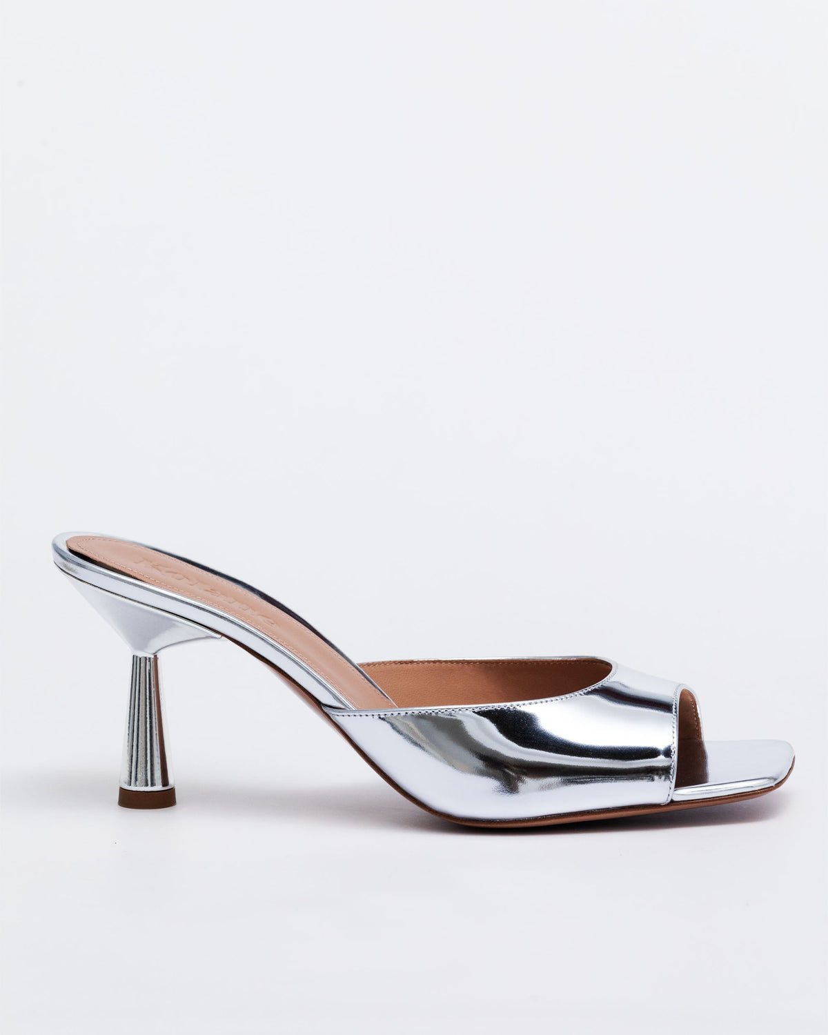 Silver Kolane Greta Mule with mirror leather upper and low high heel, stylish slip-on footwear for women.