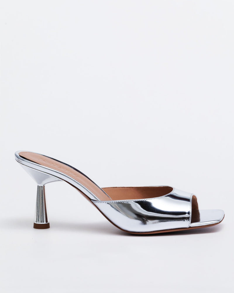 Silver Kolane Greta Mule with mirror leather upper and low high heel, stylish slip-on footwear for women.