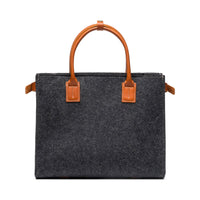 Kyrgies handmade wool handbag with colorful woven design, featuring a sturdy strap and artisanal craftsmanship.