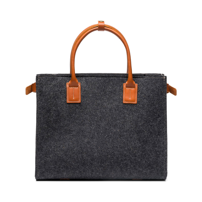Kyrgies handmade wool handbag with colorful woven design, featuring a sturdy strap and artisanal craftsmanship.