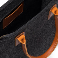 Kyrgies handmade wool handbag featuring a soft, textured design with leather accents and a spacious interior for everyday use.