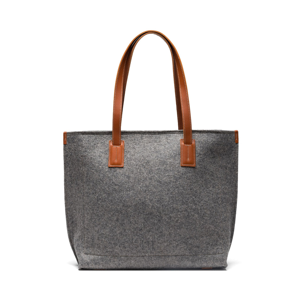Kyrgies handmade wool tote bag with sturdy handles and natural wool texture, perfect for everyday use.