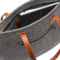Kyrgies handmade wool tote bag with natural woven design, featuring sturdy handles and spacious interior for everyday use.