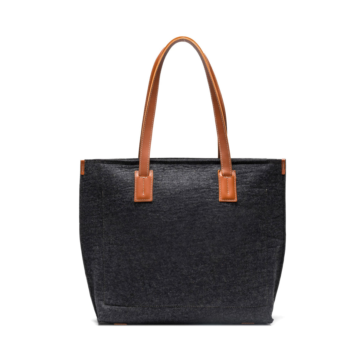 Kyrgies handmade wool tote bag with leather handles, natural fiber design, and spacious interior for everyday use.