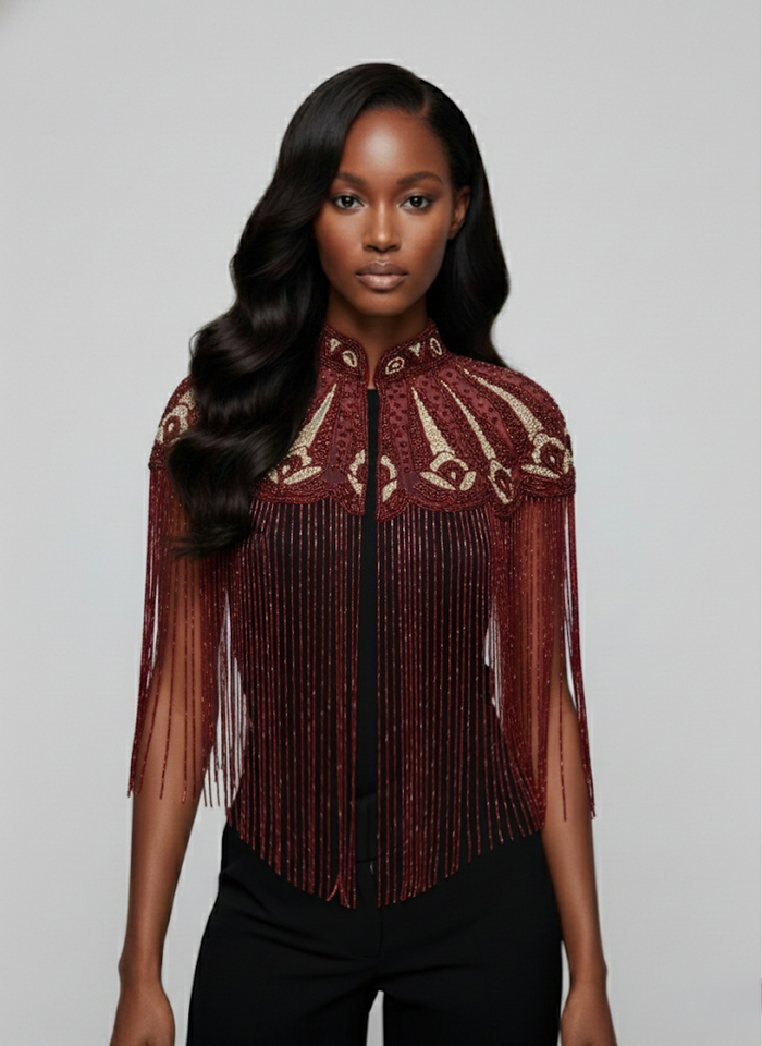 L'Jai Amor Cherry Peacock Cape with vibrant red and peacock feather pattern, flowing lightweight fabric, and elegant design.