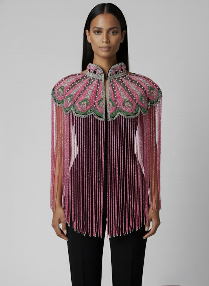 L'Jai Amor Ivy Rose Cape featuring delicate rose embroidery and flowing fabric for elegant, stylish wear.