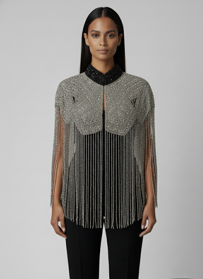 L'Jai Amor Liquid Steel Cape featuring sleek metallic fabric with a flowing, dramatic design for stylish wear