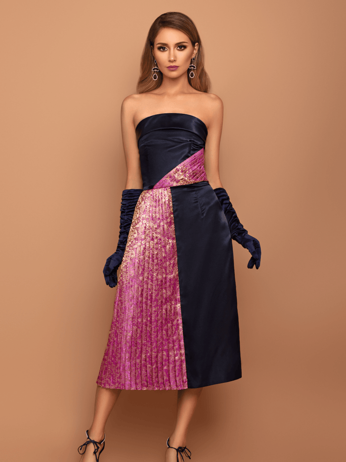 Navy La' Agra The Rani Dress with light pink floral print, sleeveless design, and elegant fit on a model.