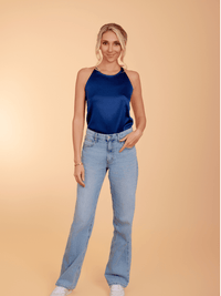 Blue La' Agra Zwani halter top with a fitted front design, showcasing a stylish and modern women's sleeveless blouse.