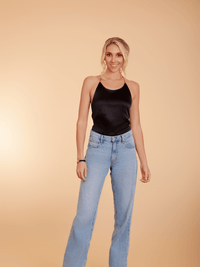 Black La' Agra Zwani Halter top with adjustable straps and a stylish design, perfect for casual or dressy outfits.