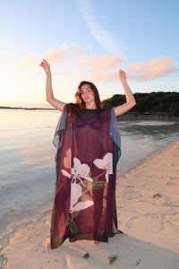 Magenta Blossom Kimono dress by LA'AVANA featuring a flowy fabric and floral pattern, displayed on a hanger.