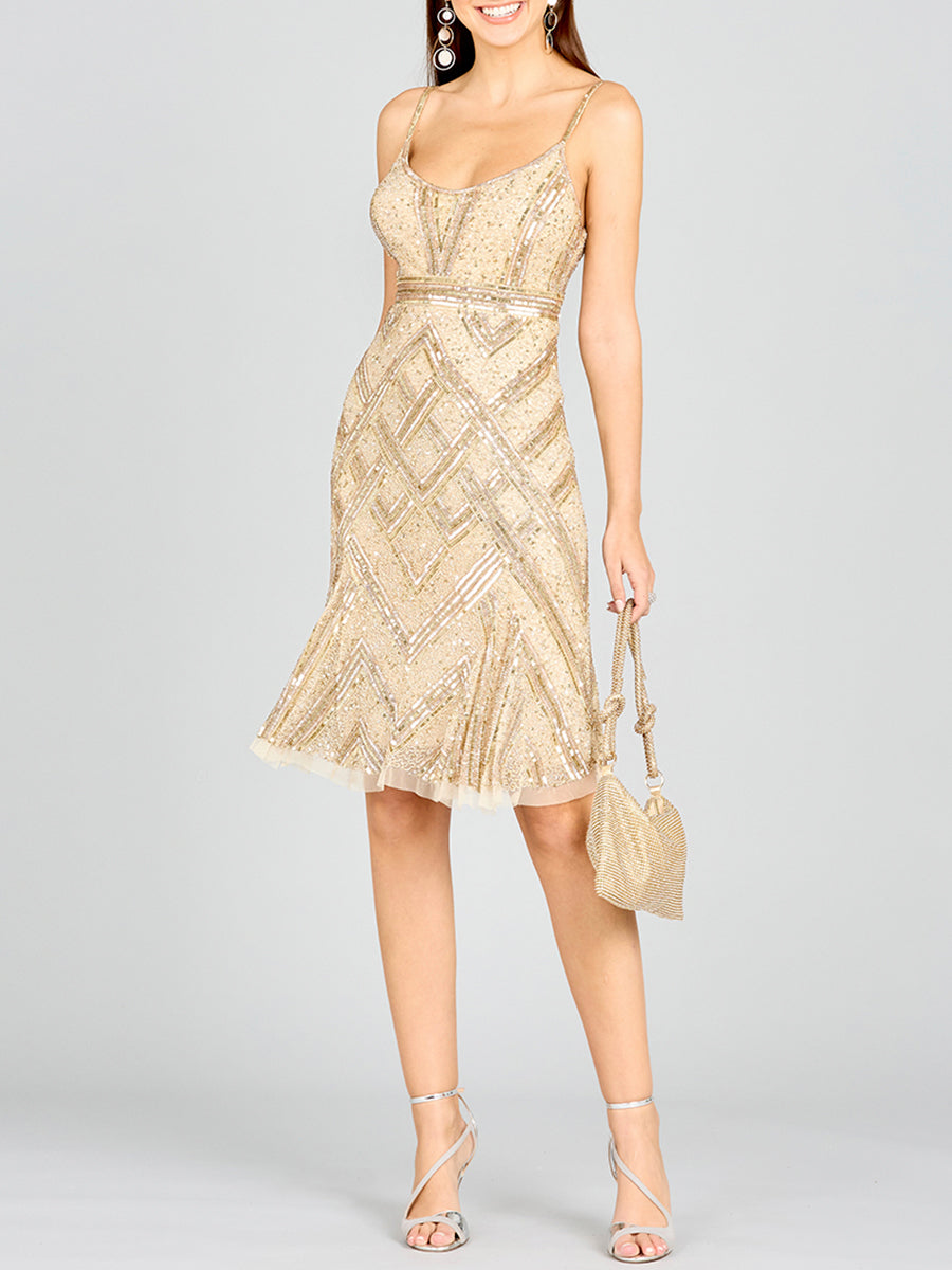 Lara New York Lara 28860 beaded flounce dress in nude with intricate beadwork and flowing fabric, displayed on a dress form.