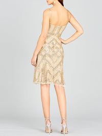 Lara New York nude beaded flounce dress with intricate detailing and flowing fabric, perfect for elegant occasions.
