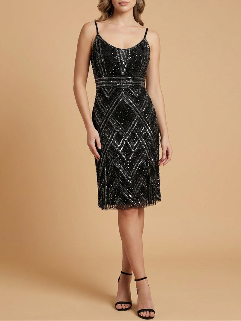 Lara New York nude beaded flounce dress with intricate detailing and flowing design, shown on a model.