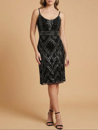 Lara New York nude beaded flounce dress with intricate detailing and flowing design, shown on a model.