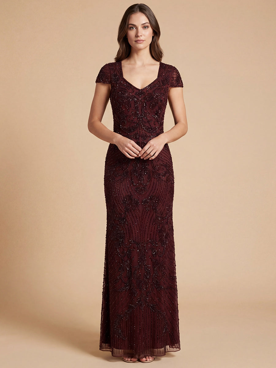 Lara New York beaded cap sleeve gown in nude, elegant formal dress with intricate beadwork and flowing fabric.