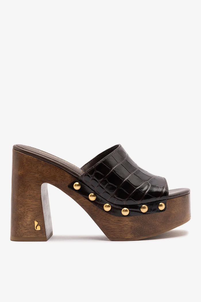 Larroudé x Kenneth Cole dark oak croco leather mule, stylish slip-on footwear with textured crocodile pattern and sleek design.