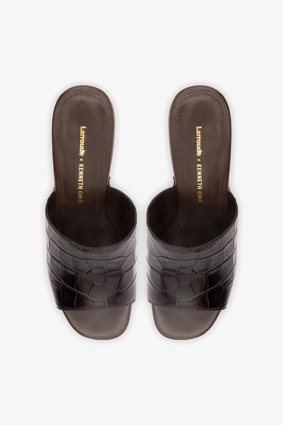 Larroude x Kenneth Cole dark oak croco leather mule with sleek design and pointed toe, showcasing textured crocodile pattern.
