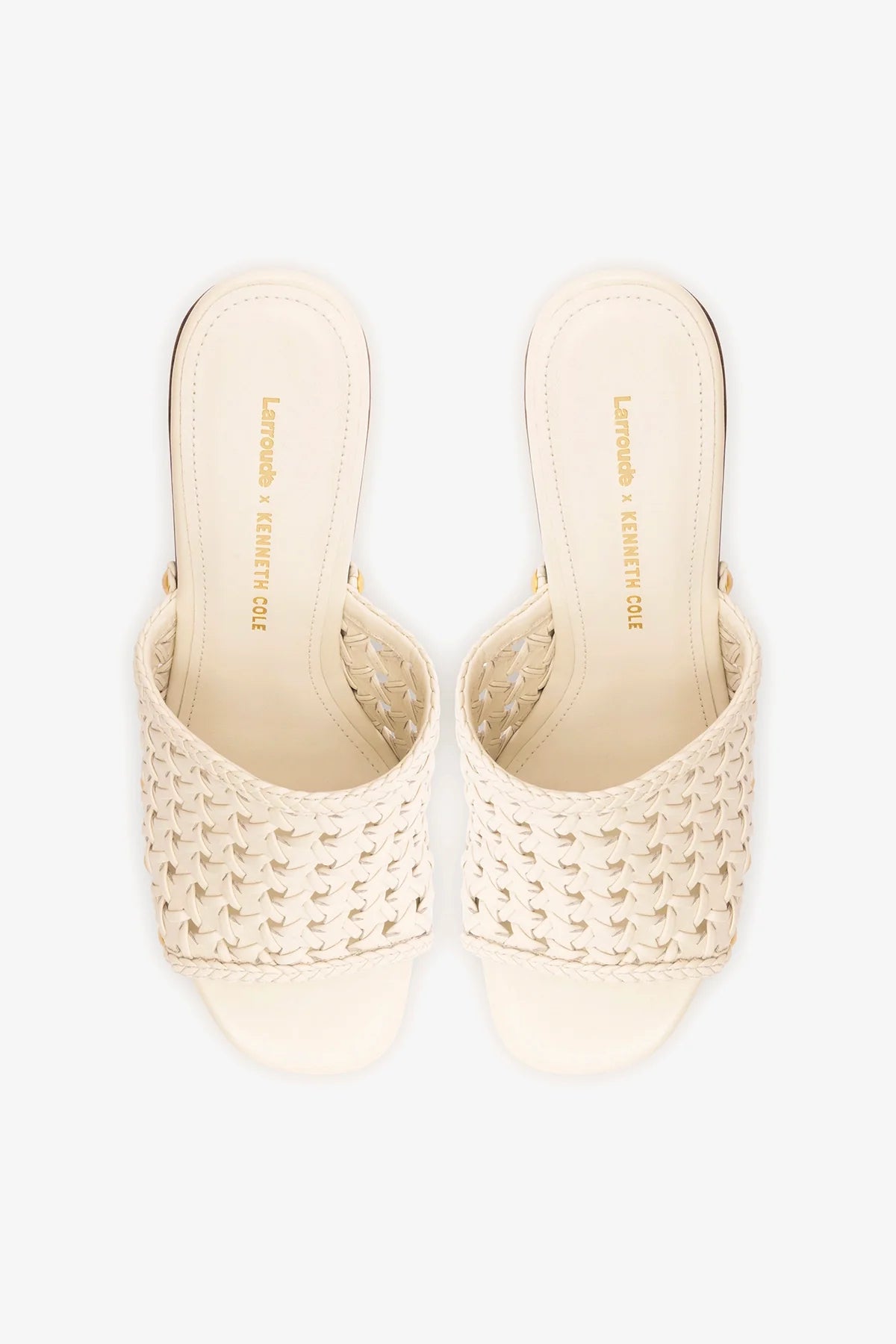Larroudé x Kenneth Cole ivory leather macrame mule showcasing a stylish slip-on design with intricate macrame details