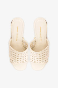 Larroudé x Kenneth Cole ivory leather macrame mule showcasing a stylish slip-on design with intricate macrame details