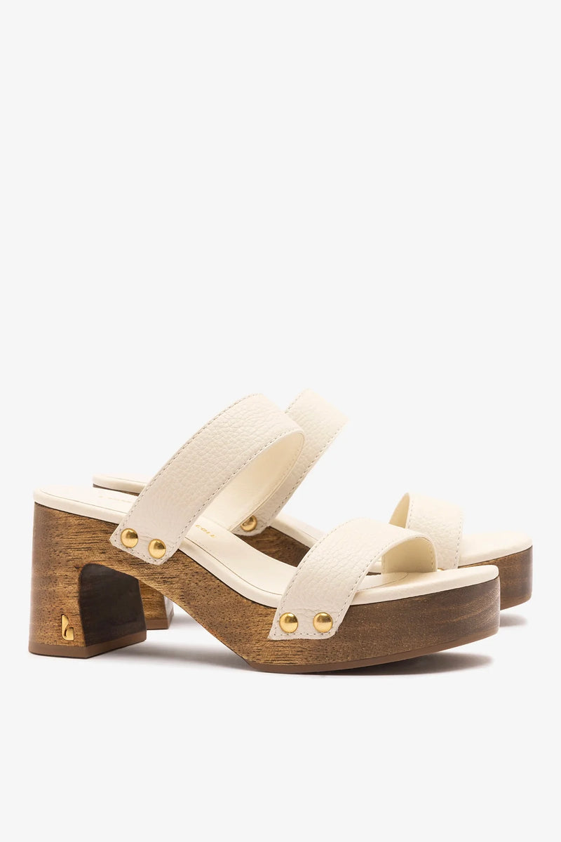 Larroude x Kenneth Cole ivory leather sandal with strappy design and low heel, perfect for casual and dressy summer wear.