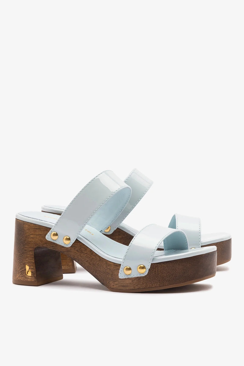 Larroudé x Kenneth Cole Sandal Maya in glossy patent leather with slim straps and a block heel, stylish and elegant footwear.