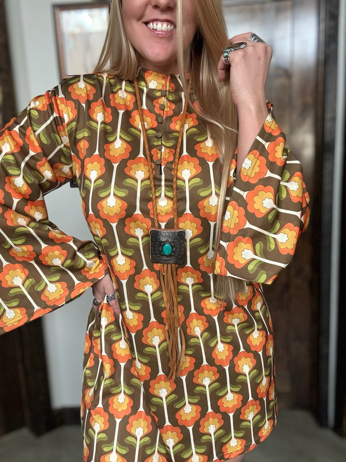 Lil Bee's Bohemian Cradle of Love Woman Retro Tulip Dress, stylish vintage-inspired dress with a tulip silhouette and floral pattern.