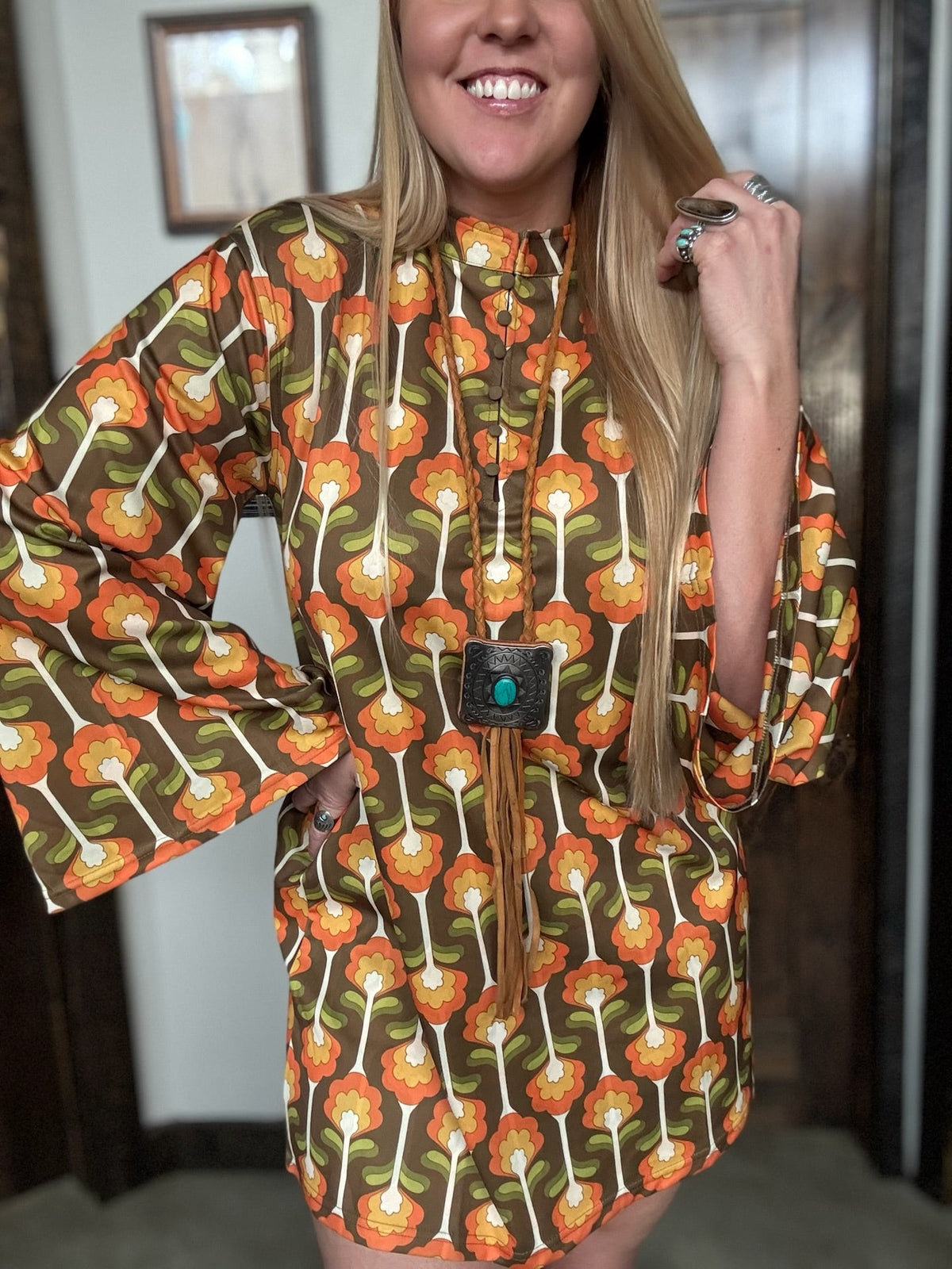 Lil Bee's Bohemian Cradle of Love Woman Retro Tulip Dress worn by a model showcasing its vintage-inspired design and flowing silhouette.