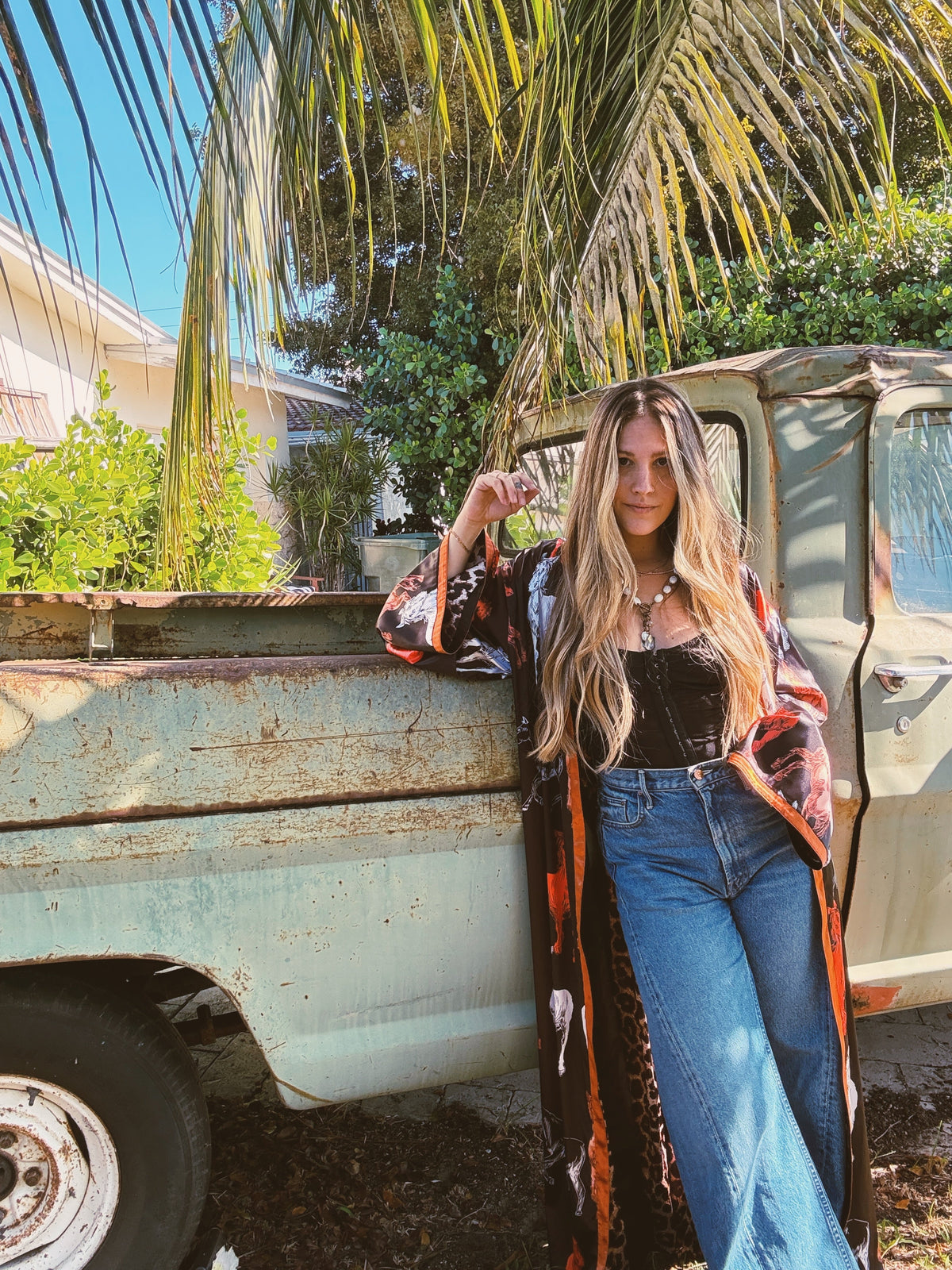 Rebel Yell horse and leopard print reversible duster jacket by Lil Bee's Bohemian, showing both patterns and lightweight fabric.