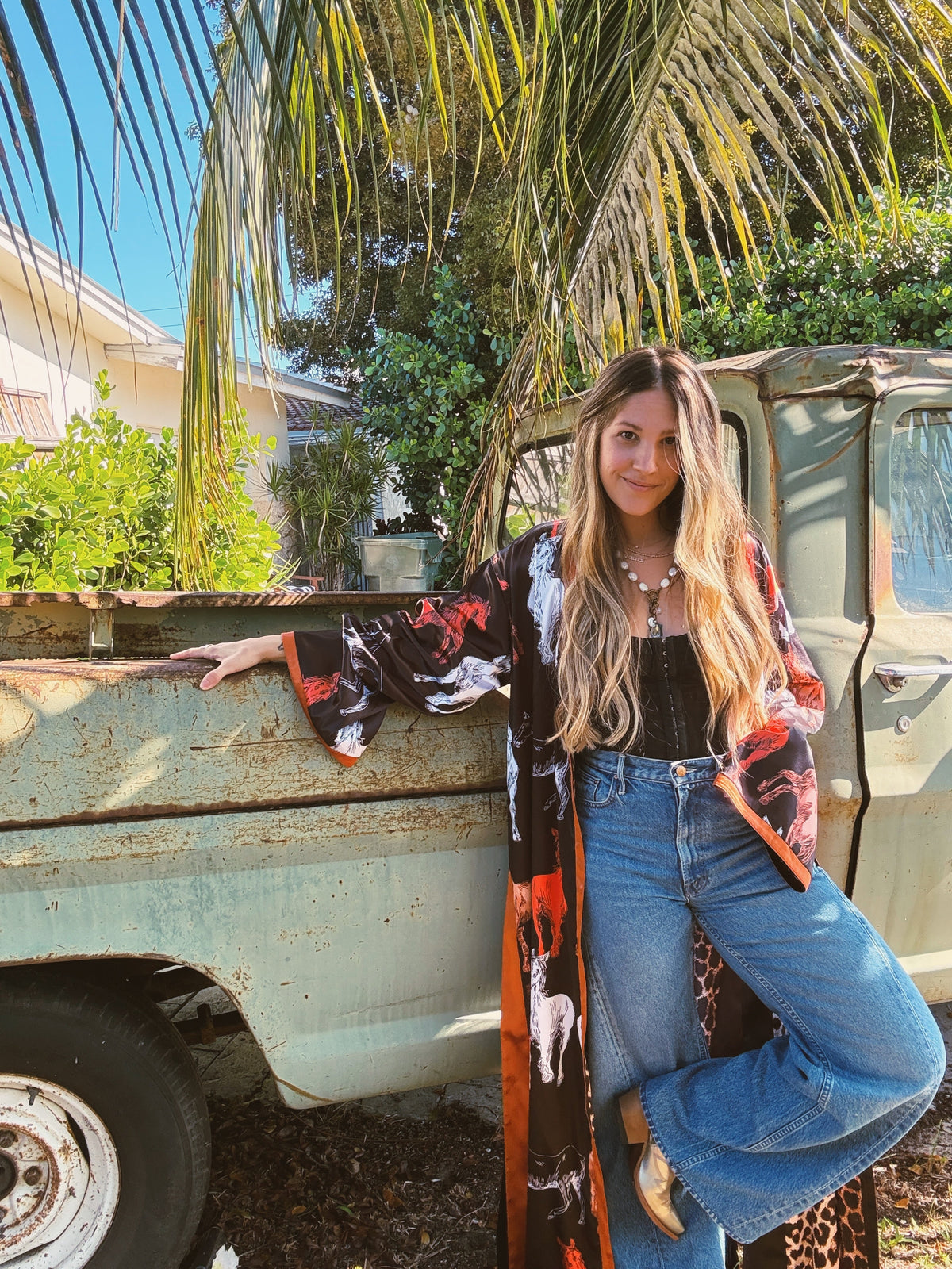 Rebel Yell horse and leopard print reversible duster by Lil Bee's Bohemian, showcasing bold animal-inspired design and flowy silhouette.
