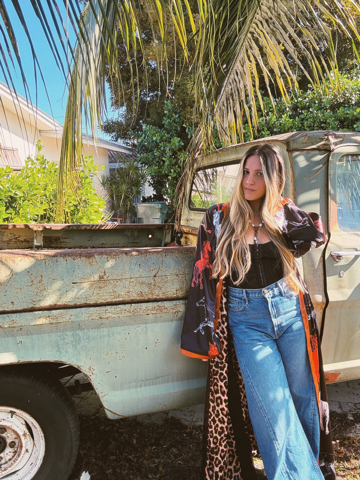 Rebel Yell reversible duster with horse and leopard print from Lil Bee's Bohemian, showcasing bold bohemian style and vibrant patterns.