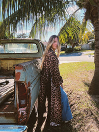 Rebel Yell horse and leopard print reversible duster jacket by Lil Bee's Bohemian, shown with one side featuring horse print and the other leopard.