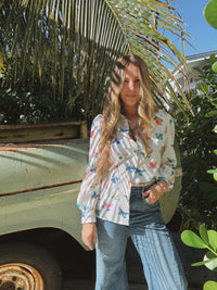 Lil Bee's Bohemian butterfly button-up blouse featuring eye-catching design, lightweight fabric, and stylish casual fit.