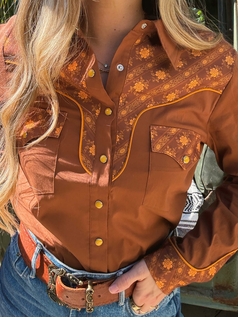 John Wayne Western brown pearl snap button-up top by Lil Bee's Bohemian, featuring classic Western style and pearl snap closures.