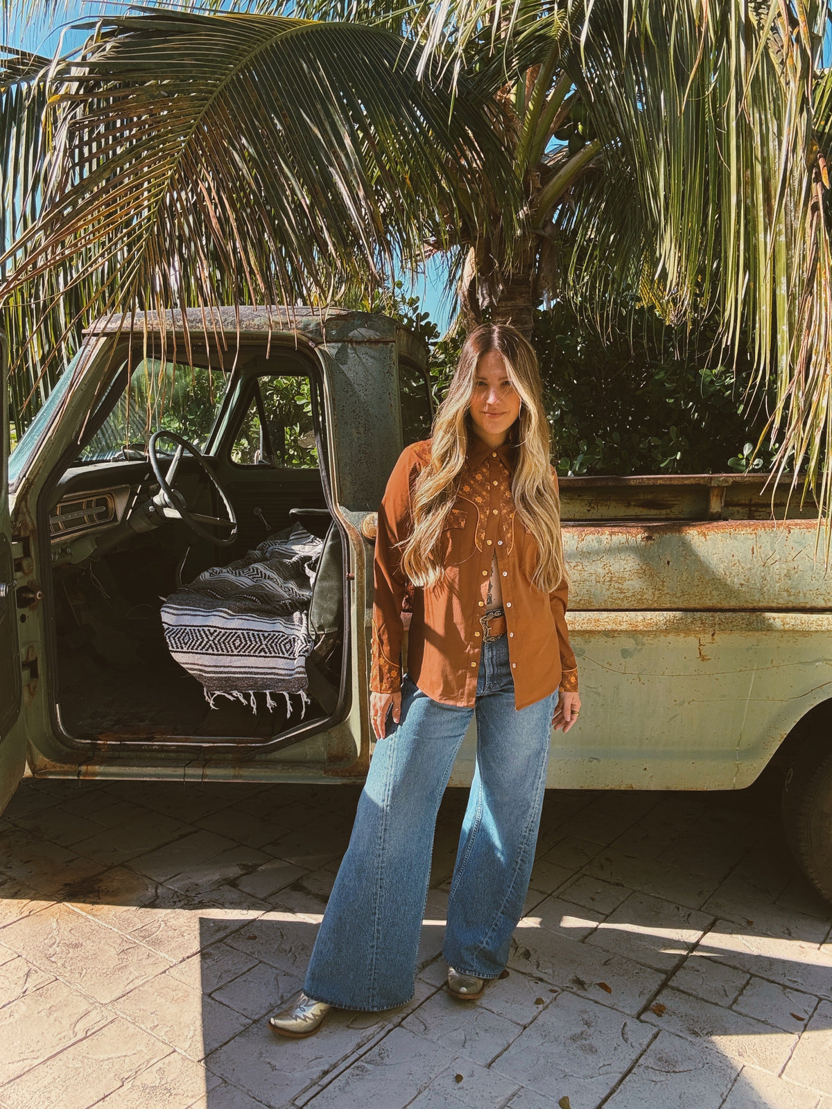 Brown John Wayne Western Pearl Snap Button Up Top by Lil Bee's Bohemian, featuring classic Western style with pearl snap buttons.