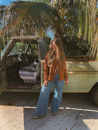 John Wayne Western pearl snap button up top in brown, casual apparel by Lil Bee's Bohemian, featuring a classic western style.
