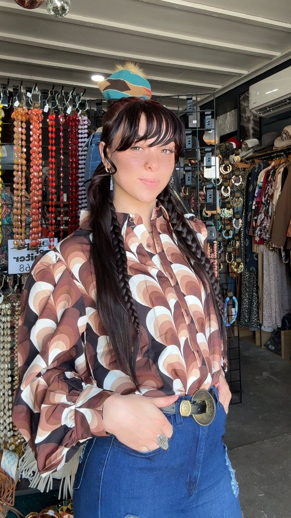 Lil Bee's Bohemian Love Calling retro heart button-up blouse, featuring a vintage-inspired design and colorful heart patterns.